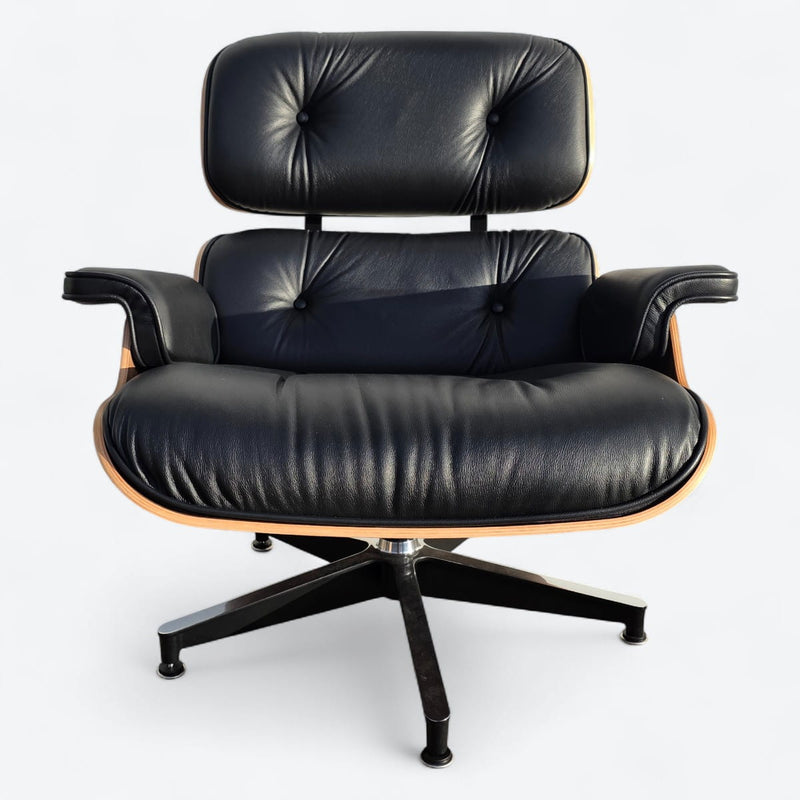 Front view of black and walnut Eames Lounge Chair