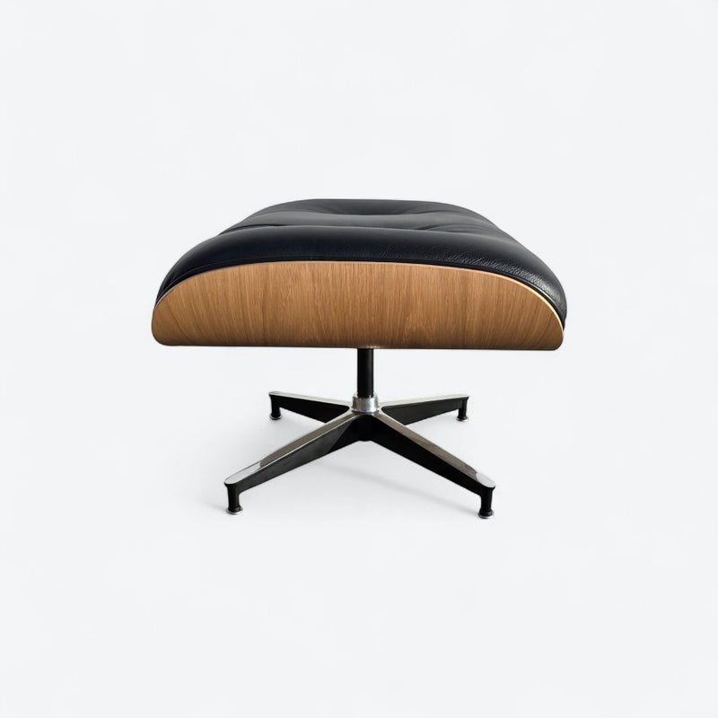 Right side view of black and oak tall Eames Lounge Chair Ottoman