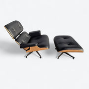 Top down right side view of black and oak tall Eames Lounge Chair and Ottoman