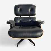 Front view of black and oak tall Eames Lounge Chair