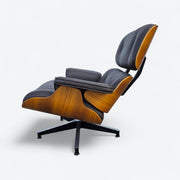 Left side view of brown walnut Eames Lounge Chair