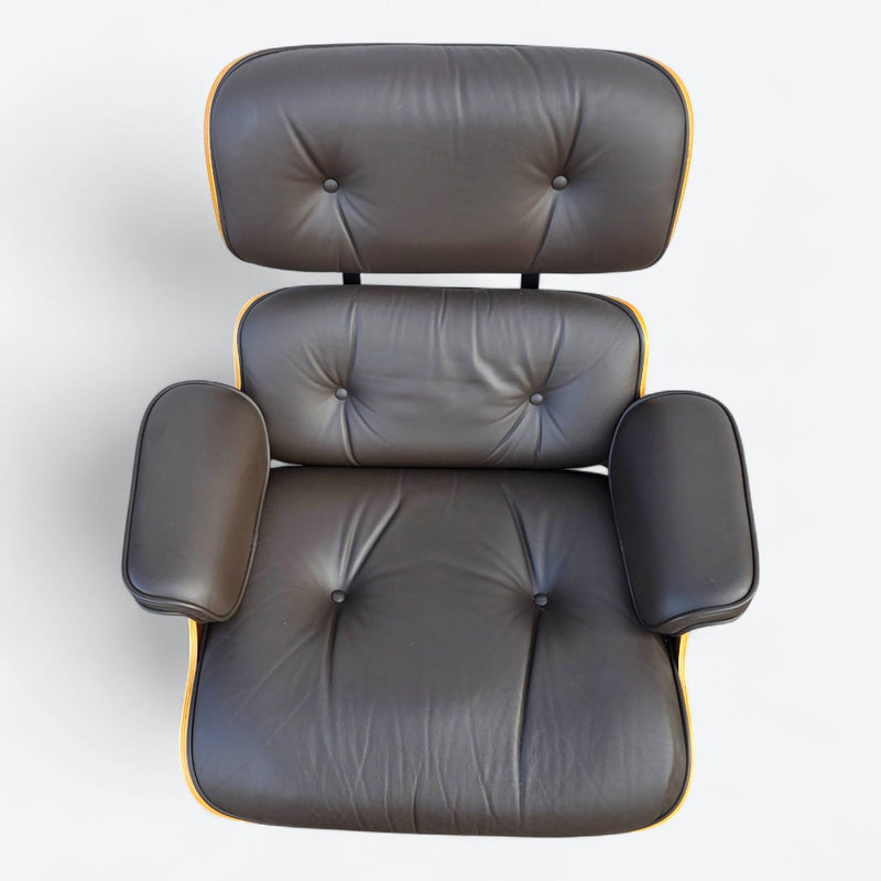 Top down view of brown walnut Eames Lounge Chair