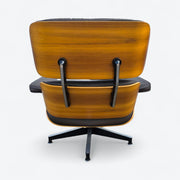 Rear view of brown walnut Eames Lounge Chair