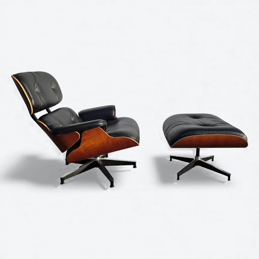 Right side view of black and cherry Eames Lounge Chair and Ottoman