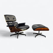 Front right angled view of black and santos tall Eames Lounge Chair and Ottoman