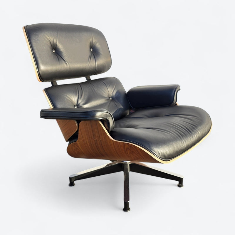 Right side angled front view of black and santos tall Eames Lounge Chair