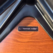 View of label on black and walnut Eames Lounge Chair and Ottoman