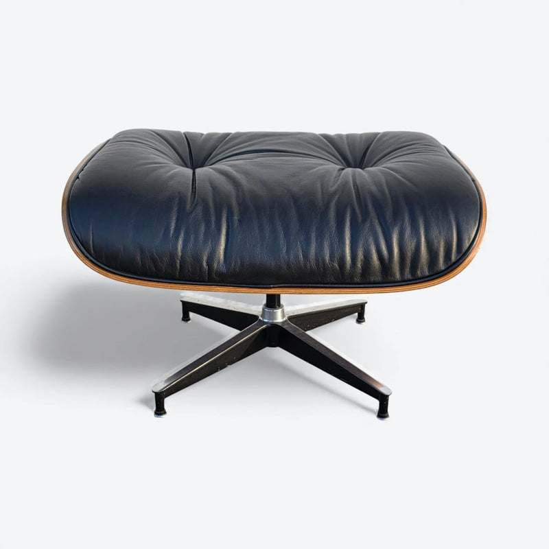 Front view of black and walnut Eames Lounge Chair Ottoman