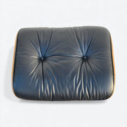 Top down view of black and walnut Eames Lounge Chair Ottoman