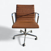Front view of tan Eames EA335 office chair