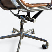 View of top of base on tan Eames EA335 office chair