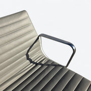 Artistic partial top down view of light grey Eames EA335 Desk Chair