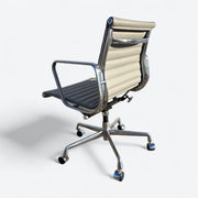 Left rear angled view of light grey Eames EA335 Desk Chair