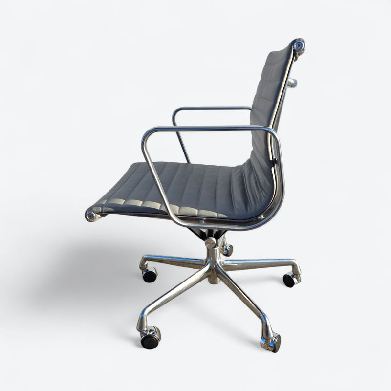 Left side view of light grey Eames EA335 Desk Chair