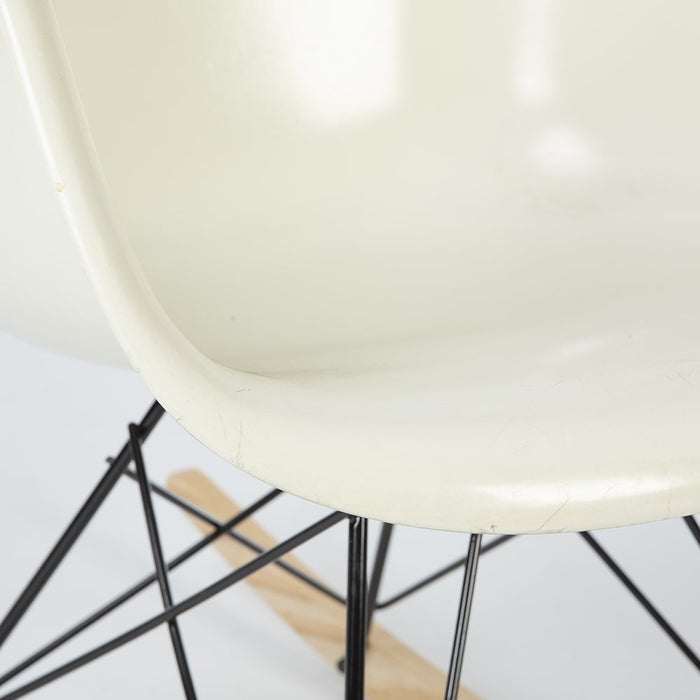 Partial front view of white Eames RAR