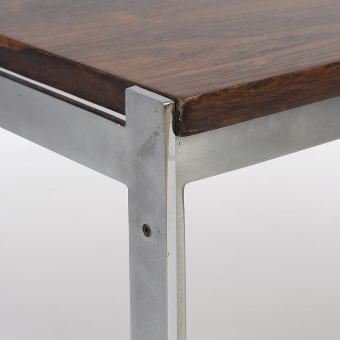 Close up corner view of rosewood Danish coffee table