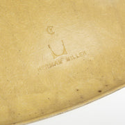 View of logo on ochre Eames DSW
