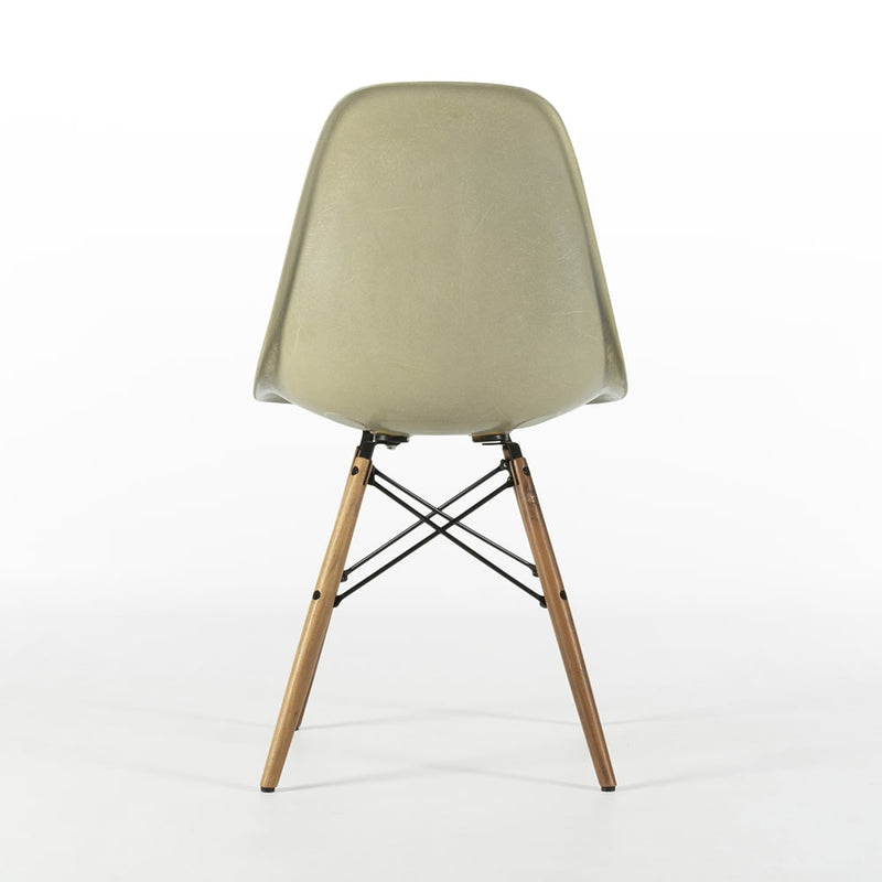 Rear view of Grey Yellow Eames side chair on a white background