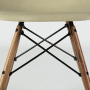 View of base on Grey Yellow Eames Side Chair on a white background