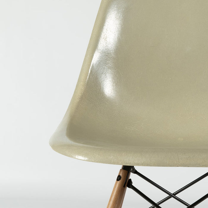 Artistic front view of Grey Yellow Eames side chair on a white background