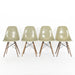 Front view of 4 Grey Yellow Eames Side Chairs on a white background