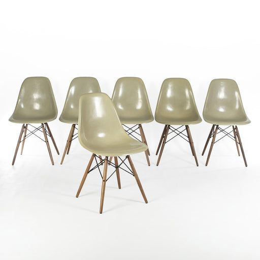 Front view of set of 6 Grey Yellow Eames side chairs on a white background