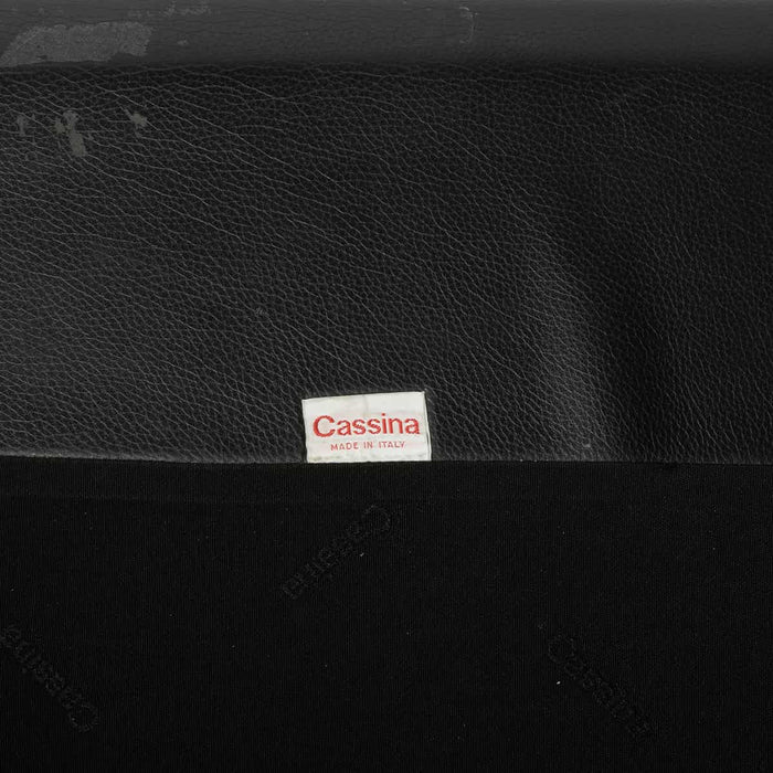 View of label on black leather Maralunga sofa