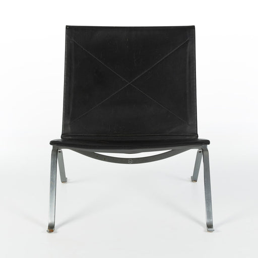 Front view of black leather Kjaerholm PK22 lounge chair