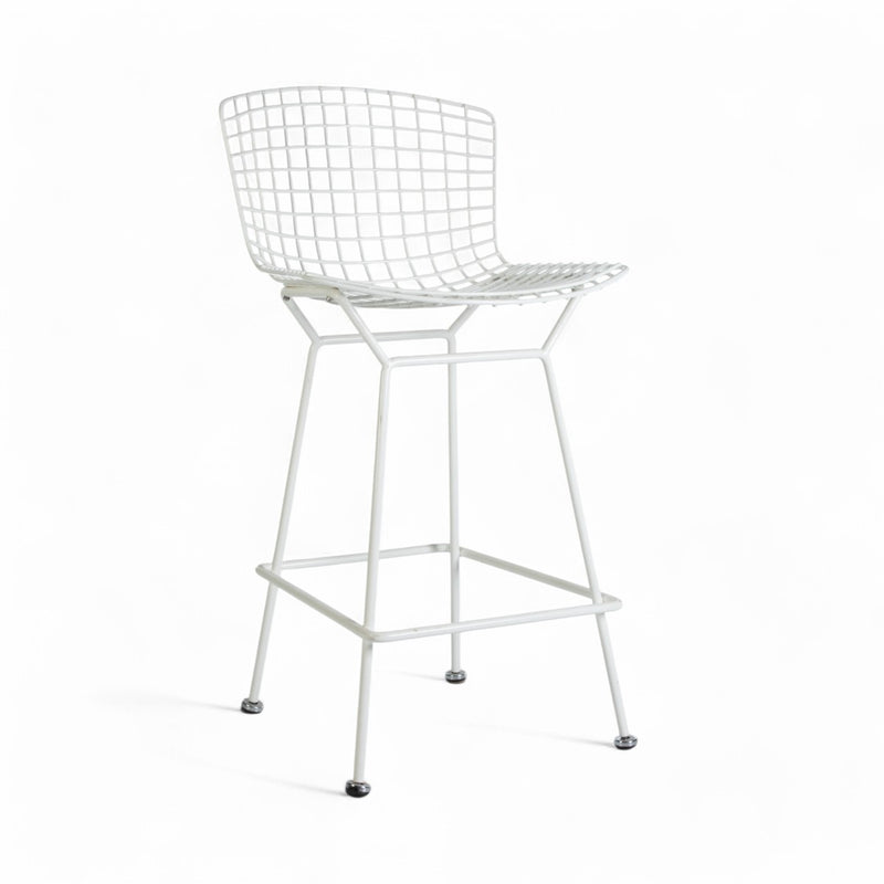 Front angled view of white Bertoia barstool