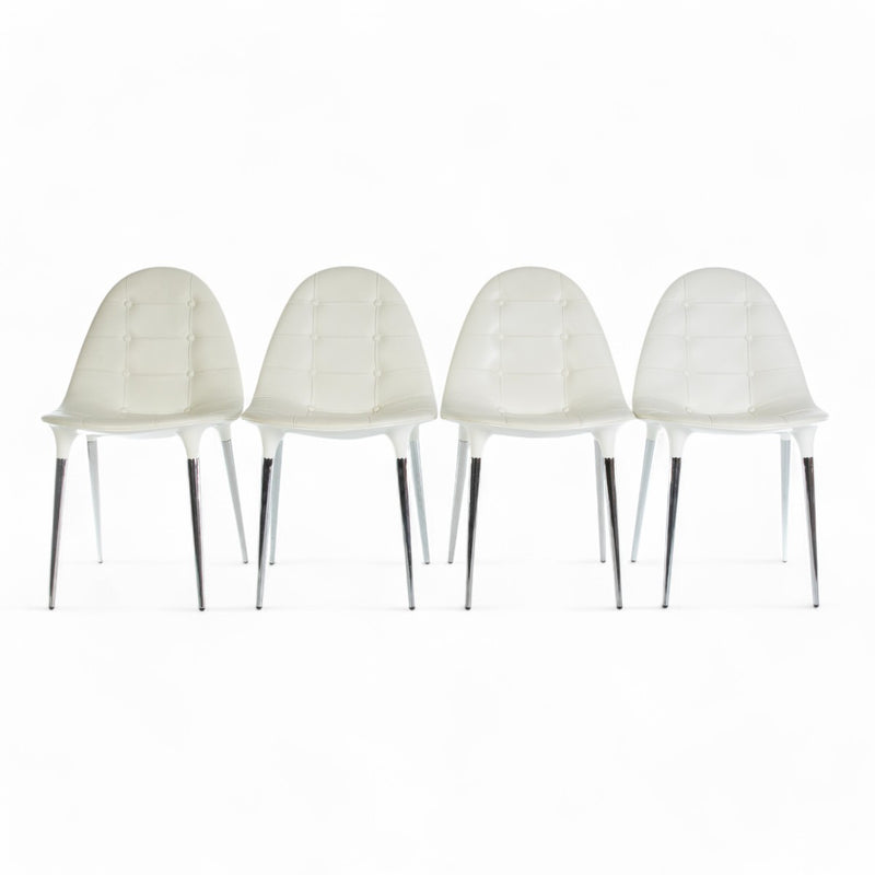 Front view of set of 4 Cassina Starck Caprice Chairs in a line
