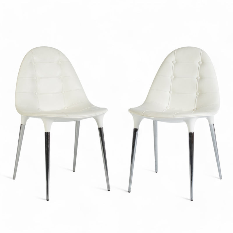 Front angled view of pair of Cassina Starck Caprice chairs