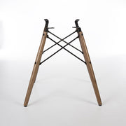 Rear view of walnut Eames dowel base