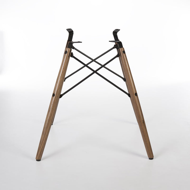 Rear view of walnut Eames dowel base
