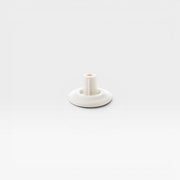 The white foot glide that fits Eames Office Chairs, desks, tables and Vitra Lounge Chairs