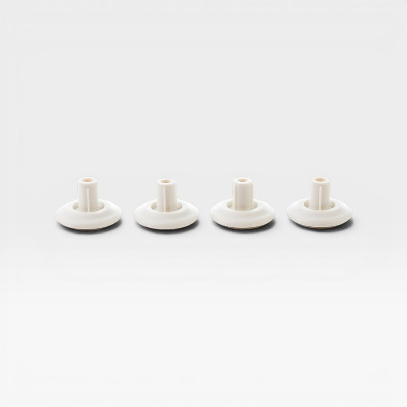 Image of full set of four white glides for Eames Office, Aluminium Lounge and Vitra Lounge Chair