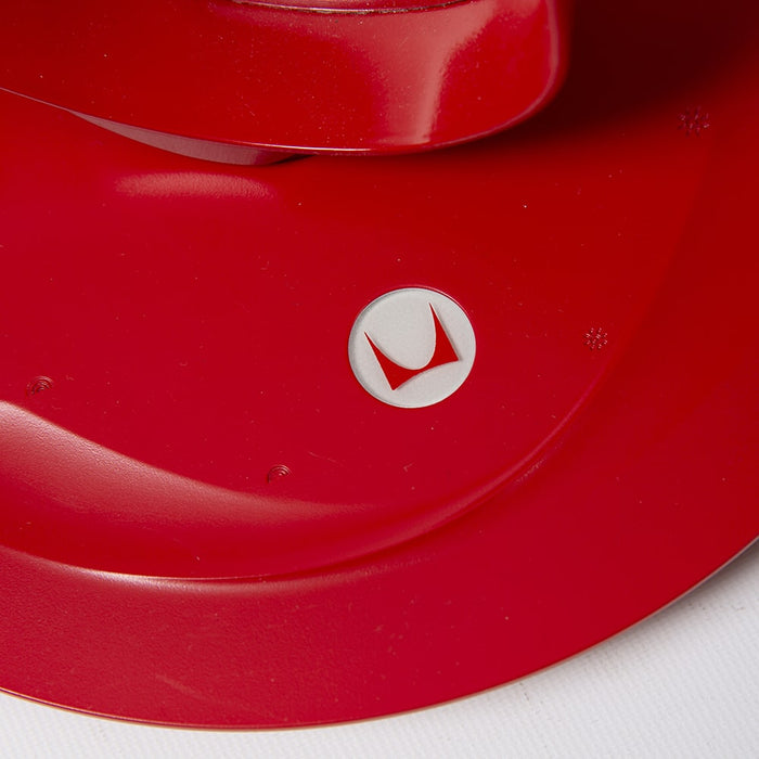 Close up view of button on red Behars leaf lamp