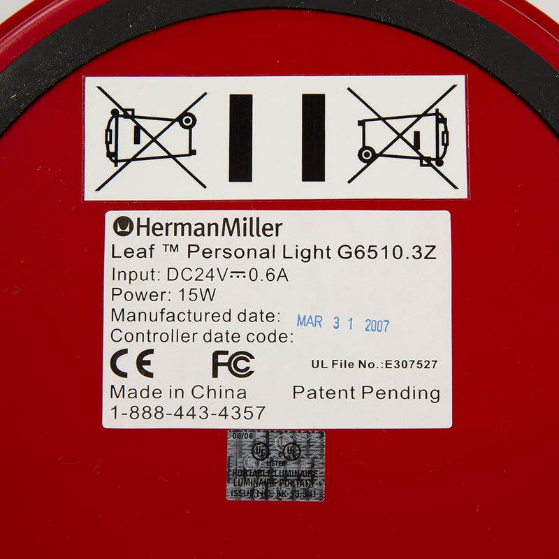 View of label on red Behars leaf lamp