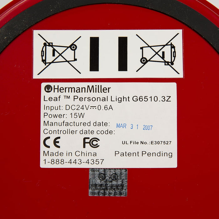 View of label on red Behars leaf lamp