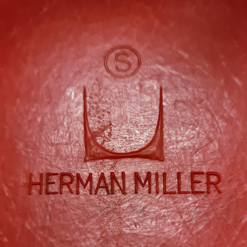 View of logo on Red Eames DSW